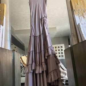 Free people gray ruffle dress that you can cinch up the ruffle in the front.